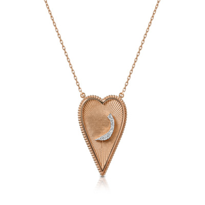 Rose gold heart-shaped pendant necklace featuring a diamond accent in the center.
