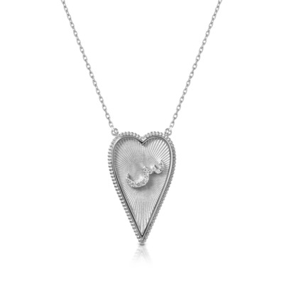 Silver heart-shaped pendant necklace with intricate design and chain.