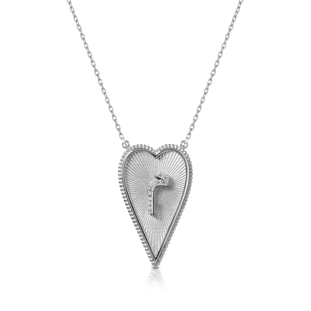 Silver heart-shaped pendant necklace featuring a diamond accent in the center.