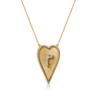 Gold heart-shaped pendant necklace featuring a diamond accent in the center.