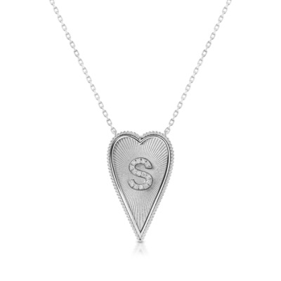 Elongated heart-shaped necklace featuring the letter S adorned with diamonds in white gold.