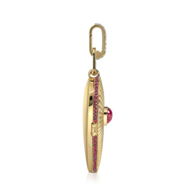 Elongated heart-shaped locket in yellow gold with a ruby and pink gemstones on the edge.