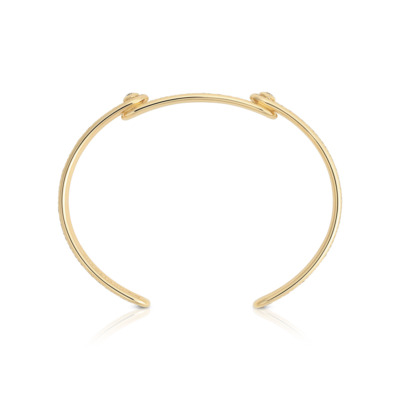 Forme Beam Cuff – Slim Model in 18k gold with an open silhouette and two diamond-set points, 0.15 ct diamonds, VS1 clarity, F color, handcrafted